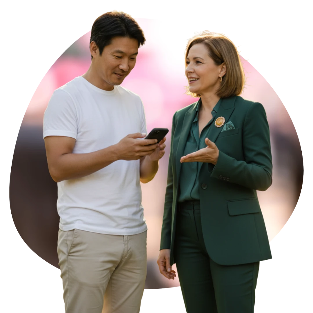 Middle-aged professional speaking with a female mortgage broker while reviewing finance options