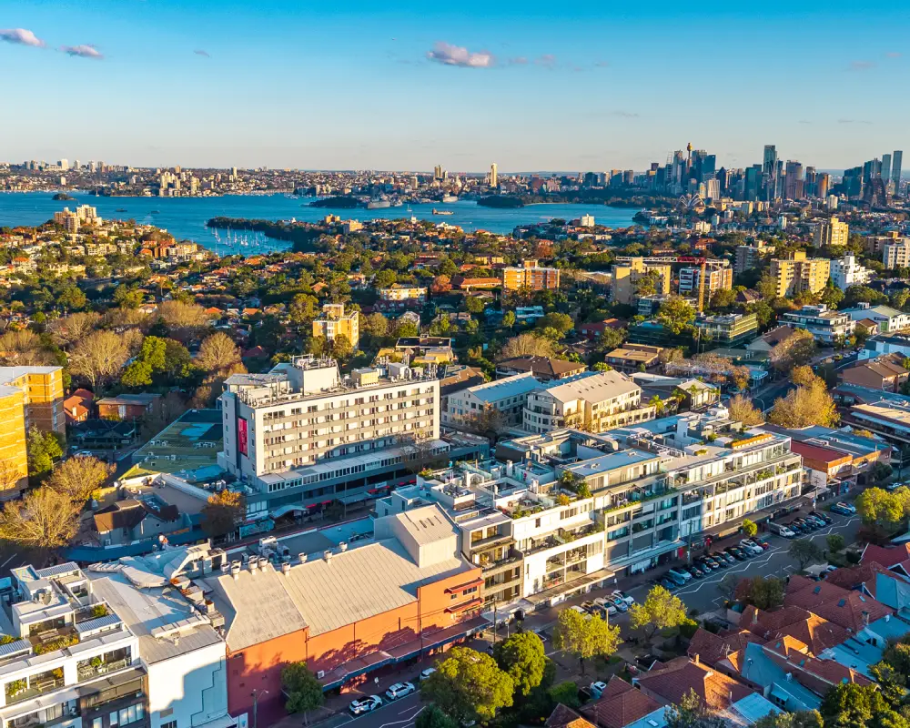 Drone view over Cremorne and Military Road with Sydney Harbour and the Sydney CBD skyline in New South Wales, Australia